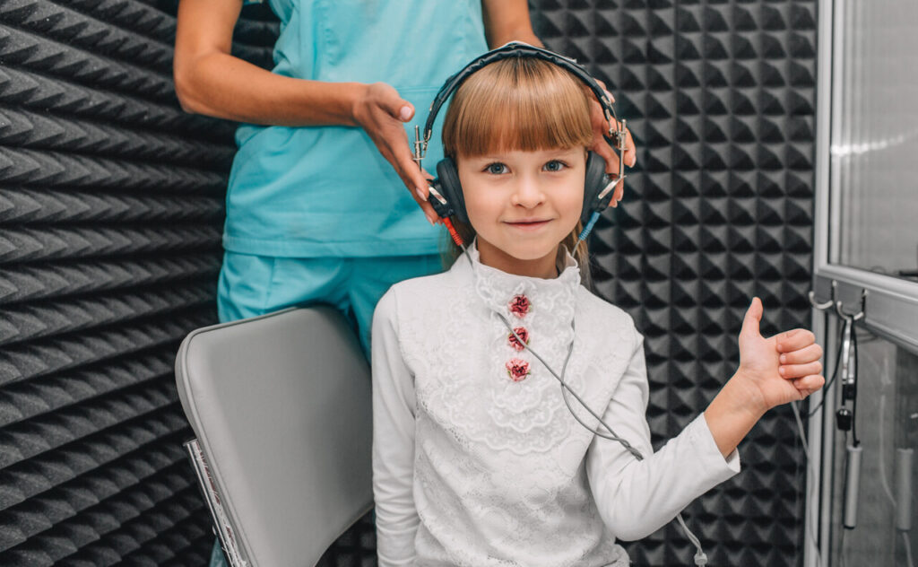 little girl during the hearing exam in the audiolo 2025 03 21 00 37 33 utc Easy Resize.com